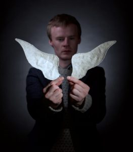 a_very_old_man_with_enormous_wings